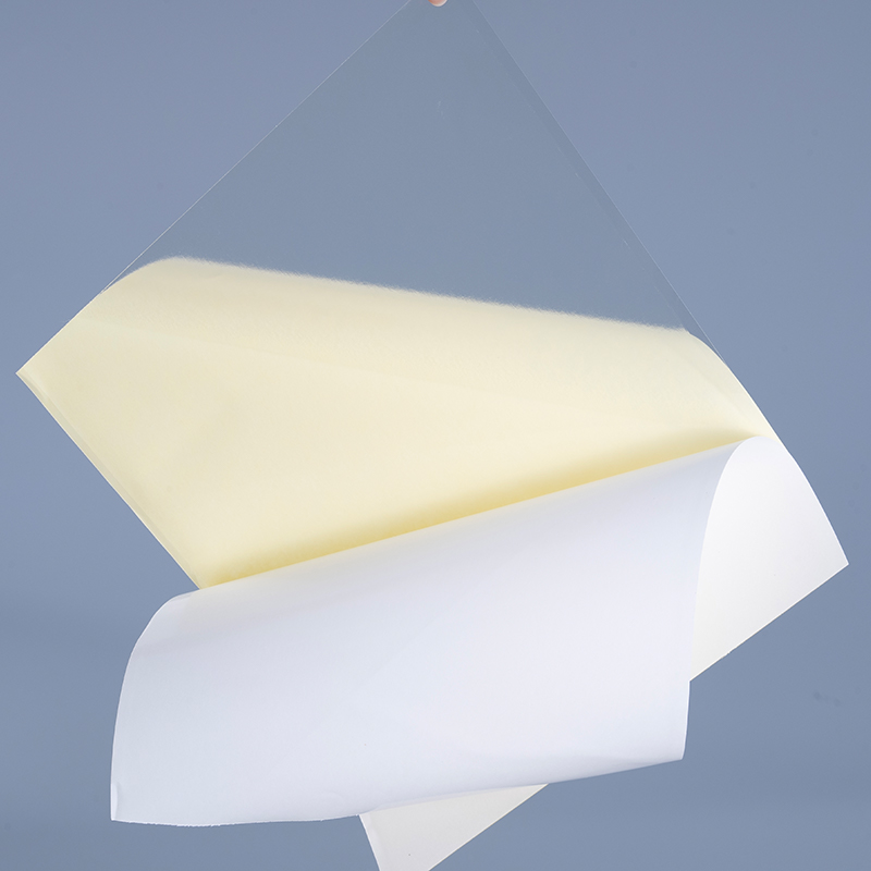 Dubbelsidigt klistermärkepapper