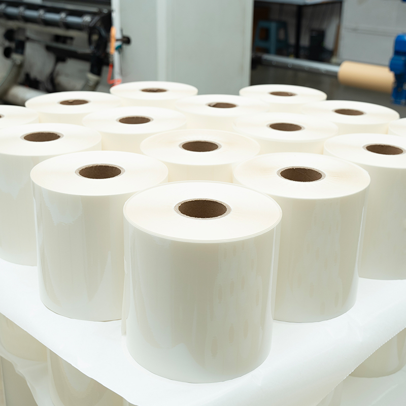 Dubbelsidigt klistermärkepapper